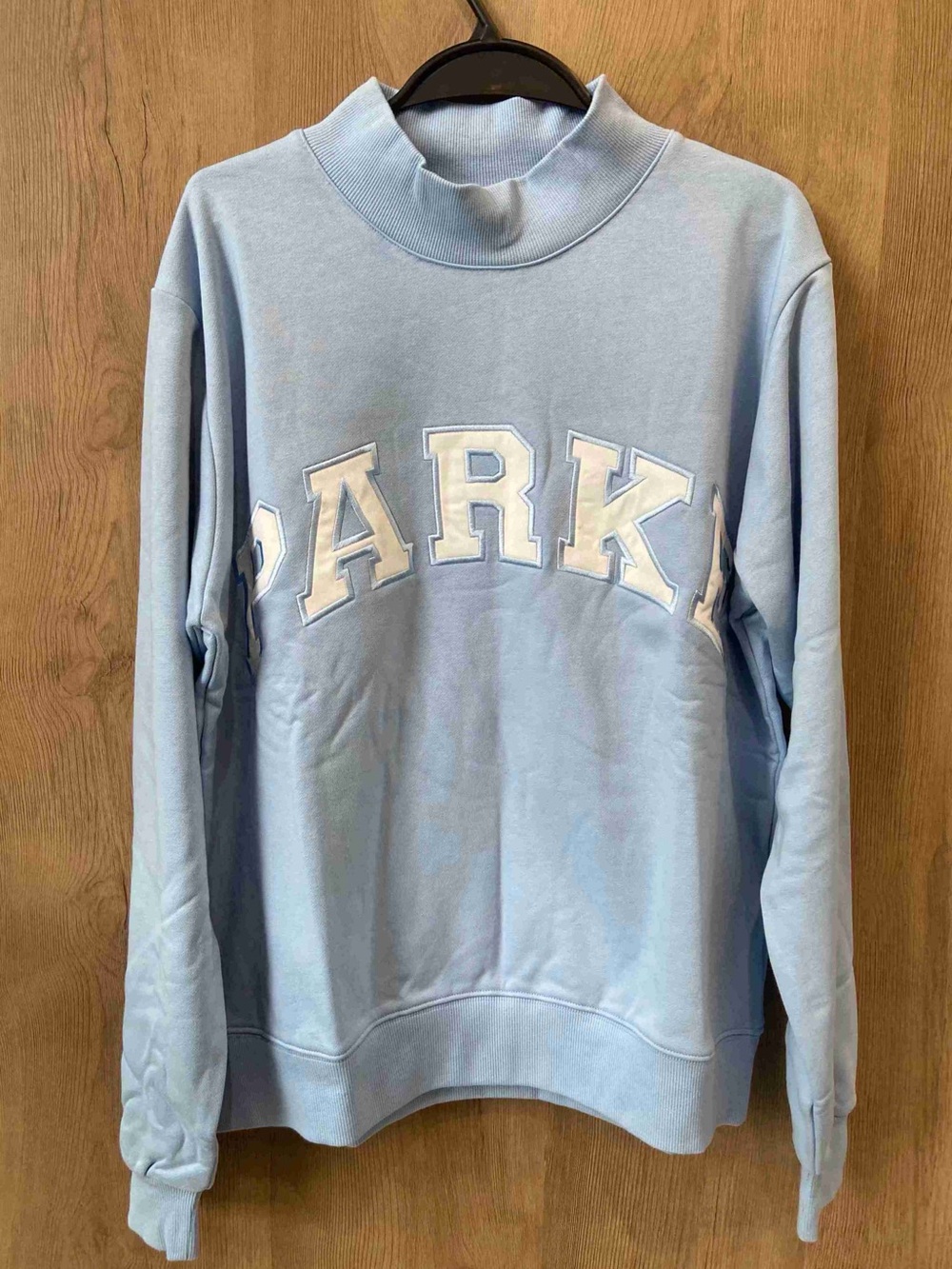 Light Blue Crewneck Sweatshirt with White 'PARK' Applique